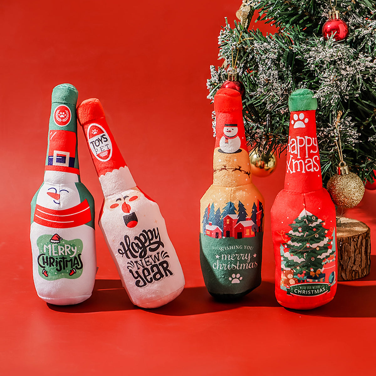 Four Christmas squeaky bottle dog toys: snowman, Santa Claus, Christmas home and Christmas tree