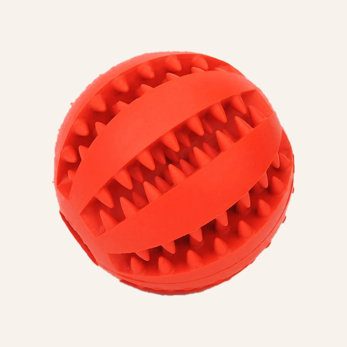 Red rubber treat ball with toothy ridges